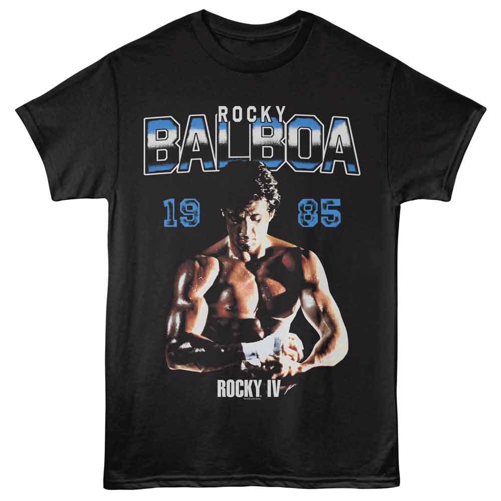 Black T-shirt featuring Rocky Balboa from Rocky IV wrapping his hands, with “1985” and “Rocky Balboa” text in blue and white.