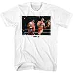 White Rocky IV T-shirt featuring Rocky Balboa fighting Ivan Drago in the ring during their climactic boxing match.