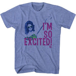 Heather blue T-shirt featuring a stylized graphic of Jessie Spano from Saved by the Bell with neon green sunglasses, a patterned top, and the large pink text “I’M SO EXCITED!”