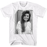 White T-shirt featuring a black-and-white portrait of Kelly Kapowski from Saved by the Bell, smiling with long hair and a casual outfit.