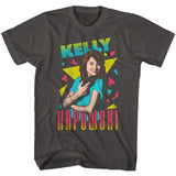 Black T-shirt featuring a vibrant retro graphic of Kelly Kapowski surrounded by yellow, pink, and teal geometric shapes, with her name in bold colorful text.