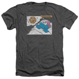 Sesame Street Cookie Monster dreaming of a cookie while tucked into bed on a dark heather gray T-shirt