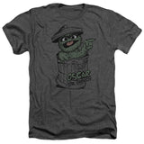 Sesame Street T-shirt featuring Oscar the Grouch popping out of his trash can with his name displayed below on a dark heather shirt