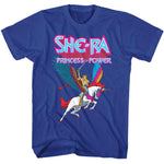 She-Ra Princess of Power graphic on a blue t-shirt showing She-Ra riding Swift Wind with colorful wings and neon She-Ra logo above.