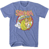 Blue She-Ra T-shirt featuring She-Ra holding her sword aloft with rainbow and star background in vintage 1980s cartoon style.