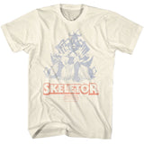 Natural cream Masters of the Universe T-shirt featuring Skeletor sitting on a throne with faded vintage-style artwork and bold Skeletor text.