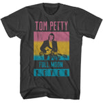 Black Tom Petty t-shirt featuring Full Moon Fever album artwork with a portrait of Tom Petty holding a guitar in pink, yellow, and blue tones.