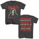 Charcoal gray Tom Petty t-shirt featuring a front portrait of Tom Petty with red lettering and a back graphic reading “Runnin’ Down a Dream” in bold vintage typography.