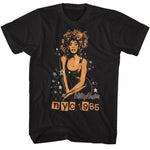 Black Whitney Houston T-shirt featuring a stylized gold portrait with stars and NYC 1985 lettering