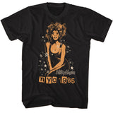 Black Whitney Houston T-shirt featuring a stylized gold portrait with stars and NYC 1985 lettering