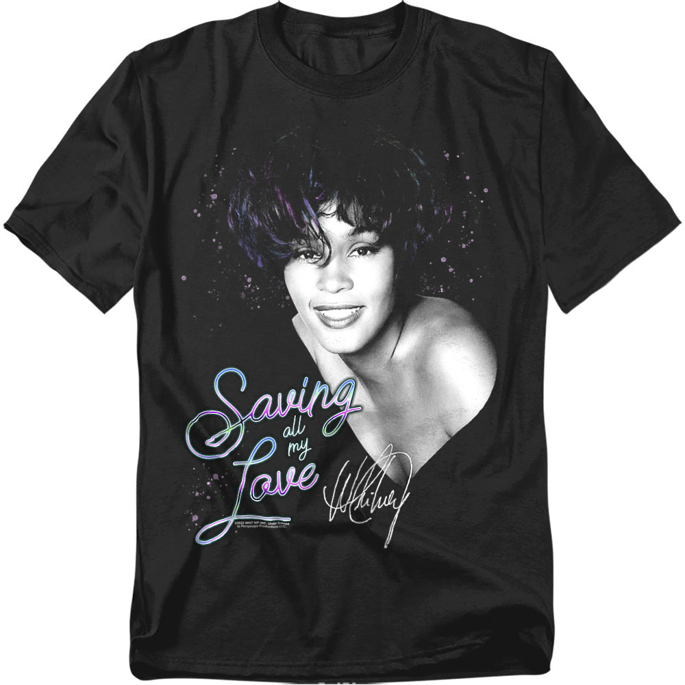 Black T-shirt featuring a black-and-white portrait of Whitney Houston with neon text reading “Saving All My Love” and her signature underneath.