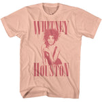 Blush pink Whitney Houston T-shirt featuring a monochrome portrait with large Whitney Houston lettering above and below