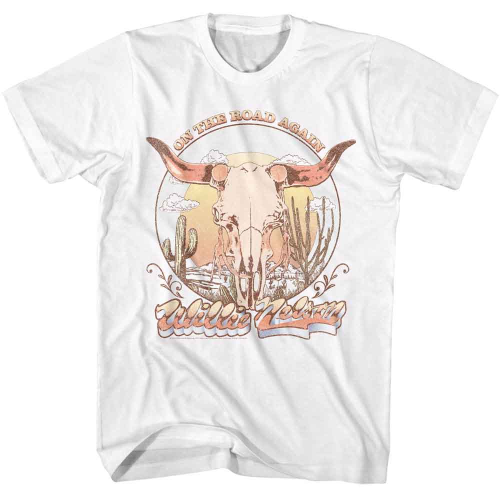 White T-shirt featuring a vintage Willie Nelson design with a steer skull, desert landscape, and “On the Road Again” text.